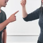 spouse in a heated argument as wife gets angry and refuses to answer when questioned