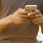 man chatting image concept as what it means when a guy uses your name in a text